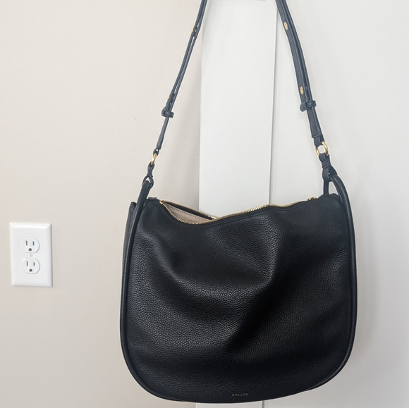 Black Hobo Bag with Adjustable Strap and Soft Leather - Picture 3 of 8